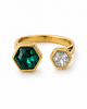 Gold open hexagon ring with green center stone and clear hexagon side stone