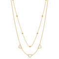 Gold necklace with heart-shaped pendants on a white background