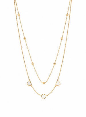 Gold necklace with heart-shaped pendants on a white background