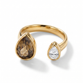Gold open ring with large brown teardrop stone and small clear round stone